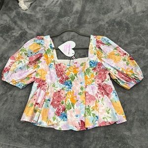 Women’s puff sleeve peplum top